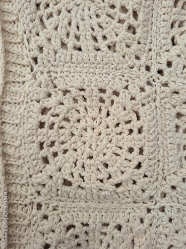 Принти на полотні Detailed close-up of a single handmade crochet granny square motif