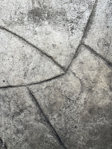 Full frame abstract texture of stamped concrete pavement with stone pattern