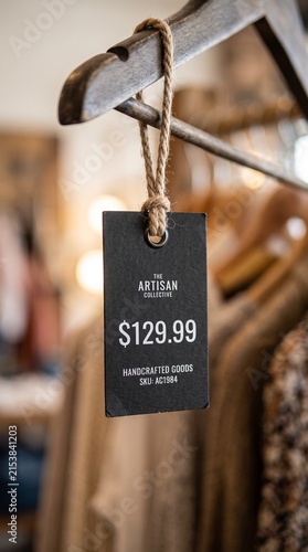 Price tag on a wooden hanger for handcrafted goods at The Artisan Collective AI GENERATED