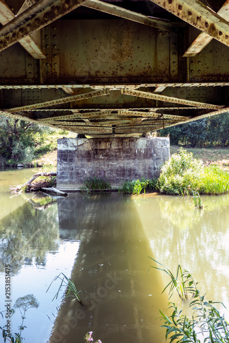 View of the railway bridge over the river from below
