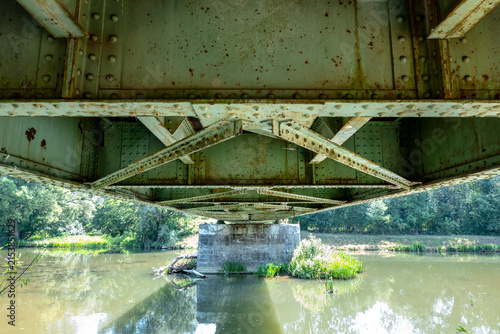 View of the railway bridge over the river from below