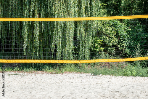 Sandy beach playground with net