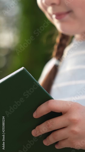girl schoolgirl kid child reading book park, close-up face book, girl schoolgirl kid child reading interesting story school book, educational information young children, historical facts, girl