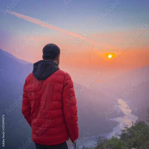 Man Watching Sunset Over the Ganges River and Himalayas Near Narendra Nagar, Rishikesh, India