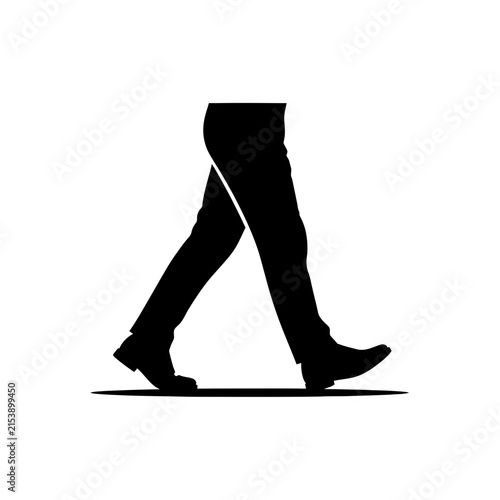 Silhouette of a person walking confidently forward.