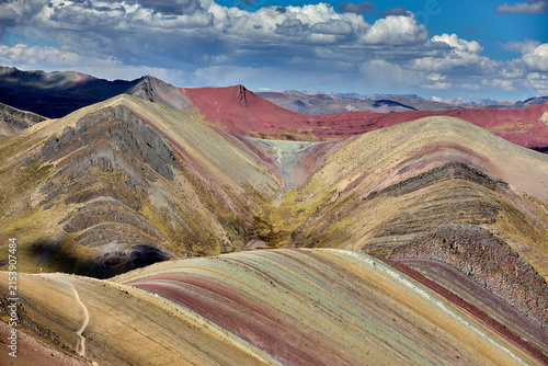 Palccoyo Rainbow Mountain, one of Peru's most extraordinary natural wonders located in the high Andes near Cusco. Unlike its more famous counterpart, Palccoyo offers a quieter, less crowded alternativ
