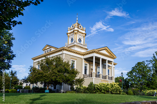 Photo of the old Burke County Courthouse in Morganton, North Carolina with a beautiful blue sky