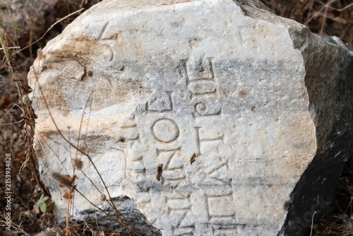 Ancient Greek Marble Inscription Fragment at Archaeological Site