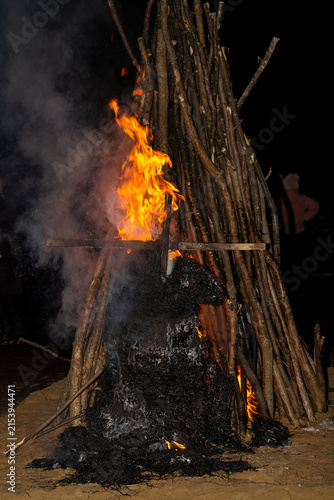 Flaming fire. Burning tree branches. Pagan rite dedicated to the arrival of spring. Big bonfire on Shrovetide. Auto-da-fe, ritual of public punishment, burning at the stake.