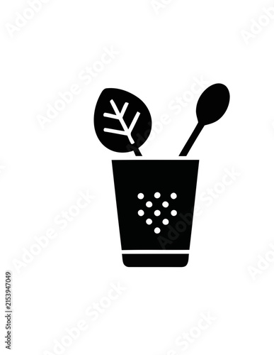 Black kitchen icon with spoon and leaf in jar.