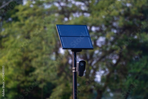 Solar powered license plate reader camera on roadside pole