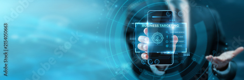 Bild auf Leinwand Marketing strategist hand hold phone with Business Targeting interface