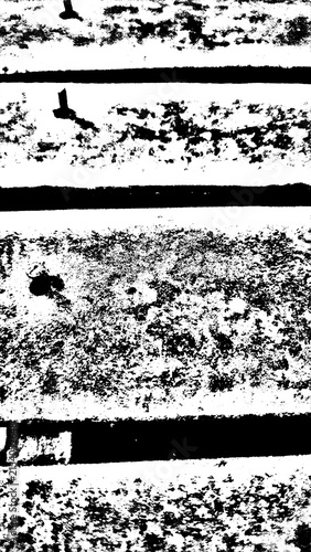 Rough black and white industrial grunge texture with distressed horizontal concrete bands and noise. Perfect for abstract art, vintage designs, and backgrounds.