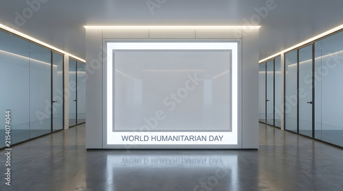 Humanitarian day event sign in modern office hallway with bright light.