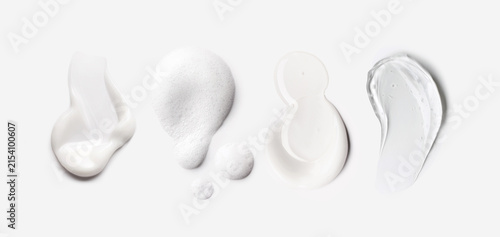 Assorted cosmetic textures on a soft backdrop