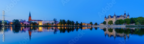 Evening panorama of the Schwerin Castle and town skyline