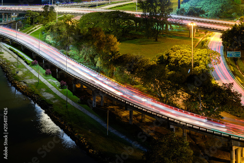 Urban road with traffic light trails