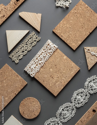 Assorted square spice samples on wooden cutting board.