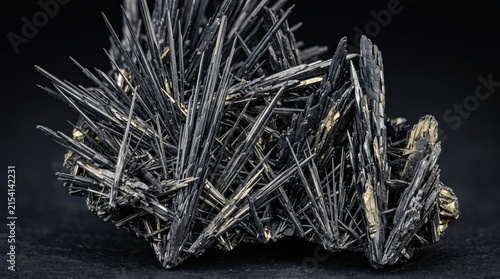 Bismuthinite Crystals Forming Long Dark Metallic Needles and Blade like Micro Cliffs