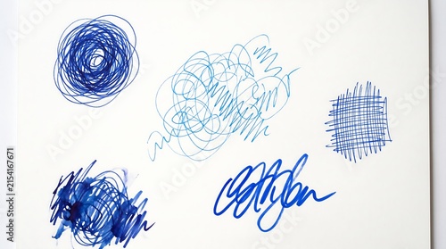 Hand-drawn blue ink doodles and abstract scribbles on white background for creative design elements or Abstract ink sketches ideal for graphic design, backgrounds, and artistic projects.