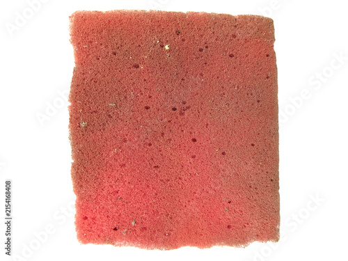 Old used red rectangular sponge texture isolated on white background