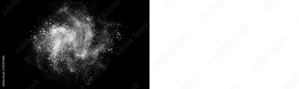 Fototapeta premium Explosion of white powder or flour isolated on black background, freeze motion of dust particles, abstract cloud isolated on transparent background