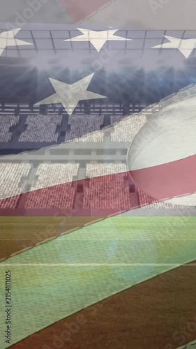 Waving american flag over multiple rugby balls falling against sports stadium