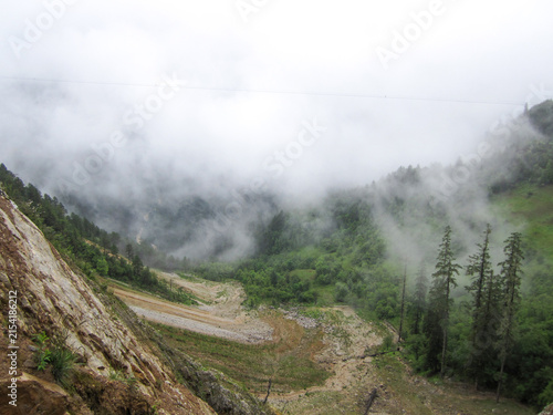 Cuadro en lienzo The mountain valley shrouded in mist