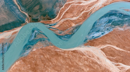 The Turquoise River Winding Through Desert Canyons From Aerial Perspective