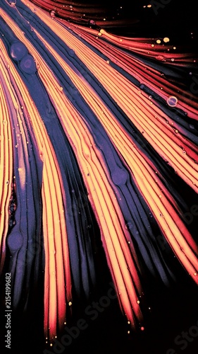 Bild auf Leinwand Abstract fluid art with vibrant orange and purple paint lines flowing on black b