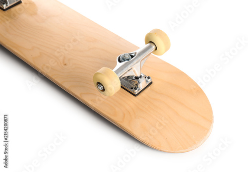 Wooden skateboard on white ...