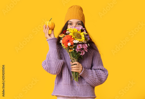 Young Asian woman with bouq...
