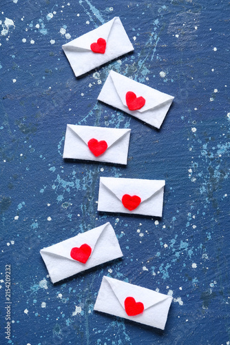 Envelopes with hearts on bl...