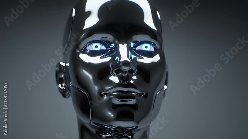 Black glossy robotic head on gray background.