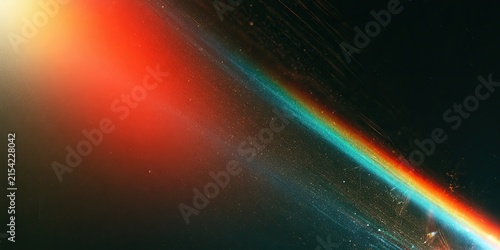 Abstract diagonal light streaks with a spectrum of colors on a dark background