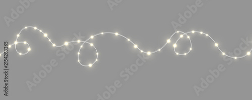 Luminous Christmas garland PNG with soft glowing LED bulbs. Warm festive lights add elegance. Isolated decoration for holiday graphics.
