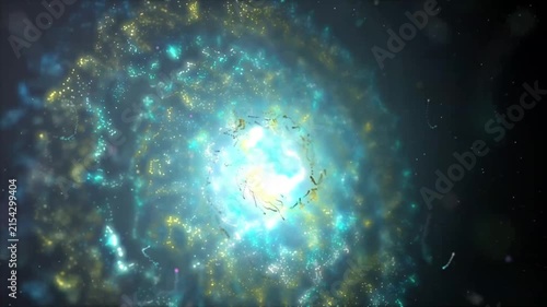 Glowing cyan and yellow particles swirling and expanding around a bright central abstract light core