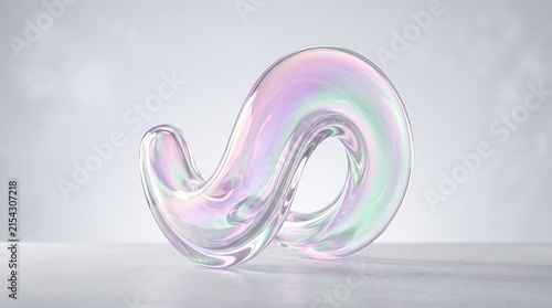 Abstract iridescent glass sculpture with curved shape sitting on a light surface