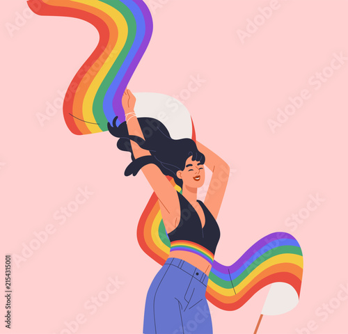 Lesbian woman with flowing rainbow-colored LGBTQ flag. Happy girl at queer pa...