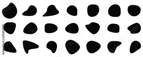 A collection of hand drawn black ink circles and irregular blob shapes isolated on a white background for graphic design and artistic