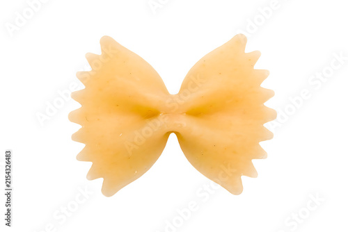 Single farfalle pasta shape isolated on black background showcasing Italian cuisine and culinary ingredients for food photography