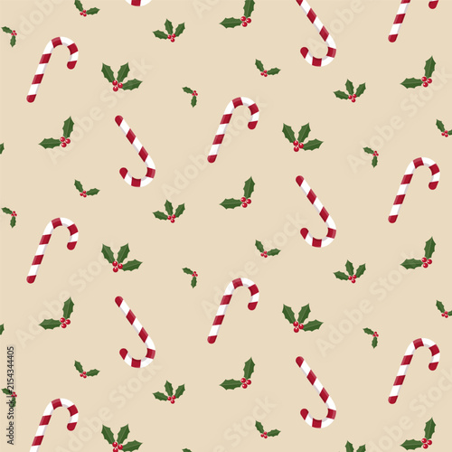 Christmas seamless pattern with candy canes and holly leaves isolated on beige background.Xmas, new year background.