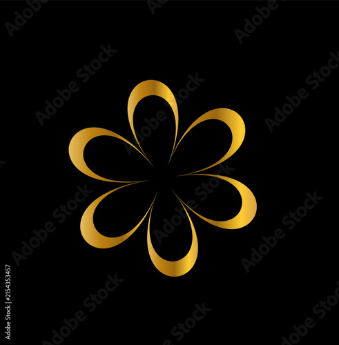 The outline of a golden flower on a black background.