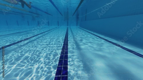 Underwater View of Swimming Pool Lanes with Swimmers