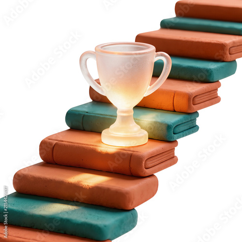Glowing Trophy Cup on Colorful Stack of Books