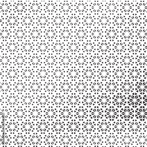 Seamless geometric pattern with intricate black and white lattice vector background design