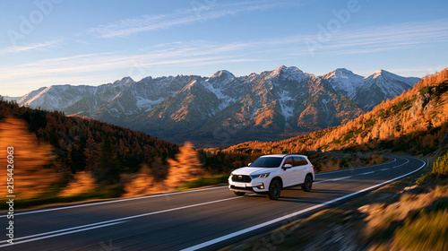 A white SUV driving on a mountain highway at sunset. It represents travel, adventure, and the freedom of modern car.