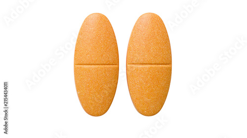 Foto Two oval orange vitamin tablets with a horizontal score line, isolated on transp