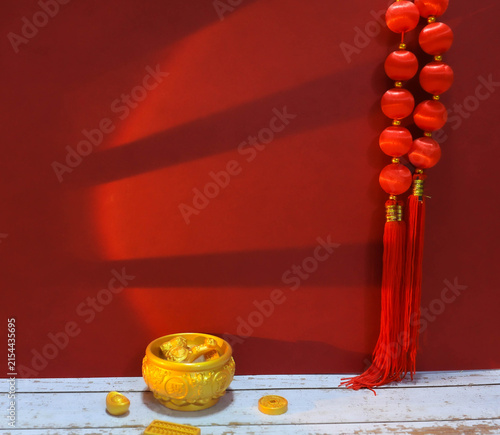 Fotografie Traditional Chinese New Year red background with lucky Chinese knot tassels and