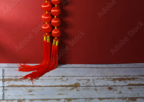 Obraz na płótnie Traditional Chinese New Year red background with lucky Chinese knot tassels and
